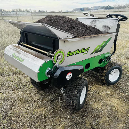 Top dressing machine in action